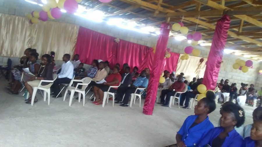 The congregation seated for a Sunday service in the church sanctuary